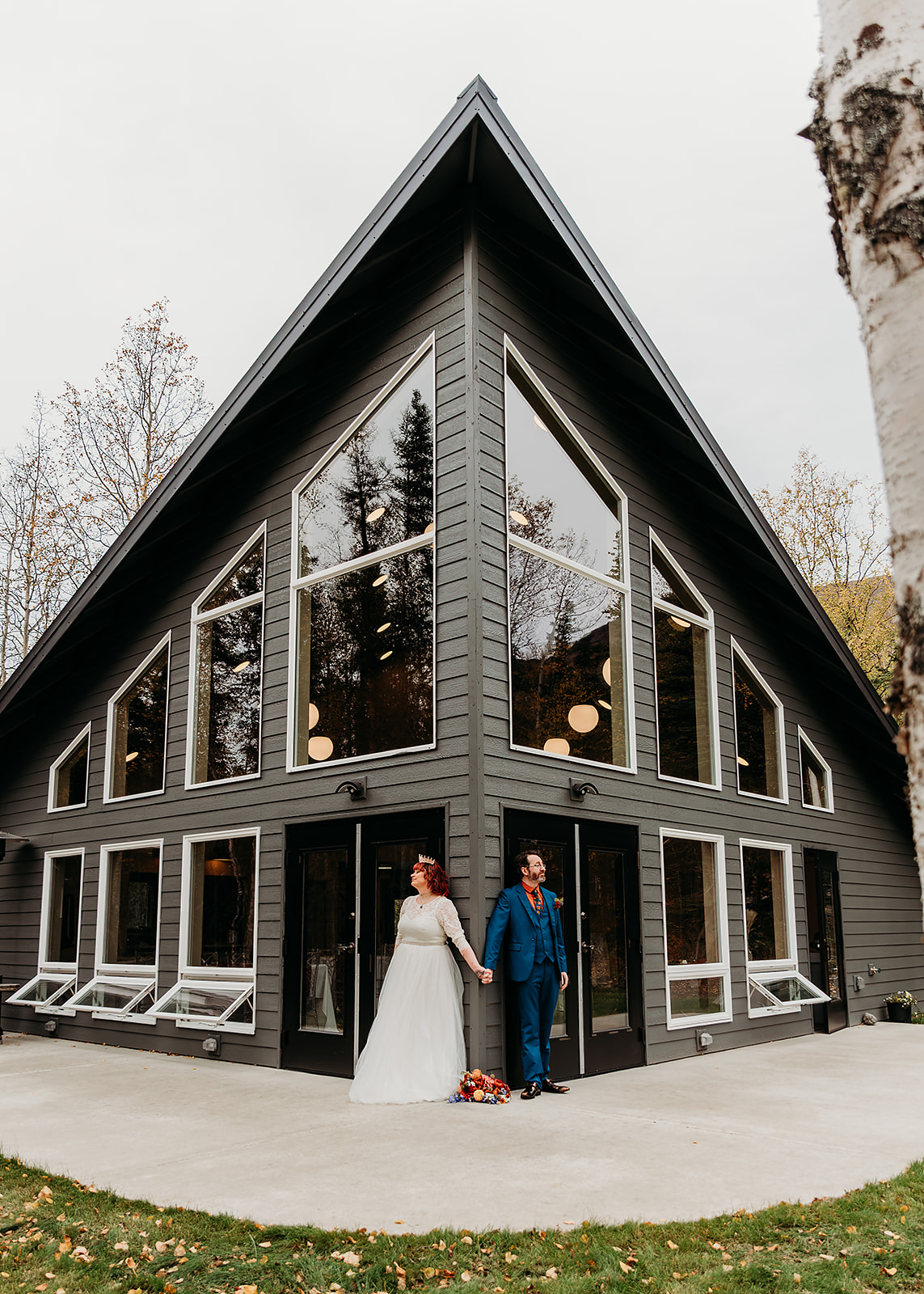 Bride and groom standing together during their wedding weekend at Bluewater Basecamp, a scenic wedding venue in Alaska ideal for destination weddings. Photo Credit: AK Berry Photography
